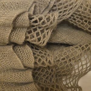 Light-weight Tan poncho with plenty of ruffles. super cute. never worn.